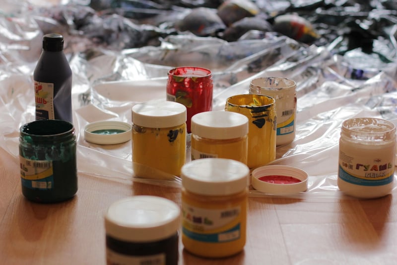 Paint brushes and paint cans